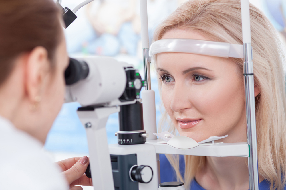A doctor doing eye exam